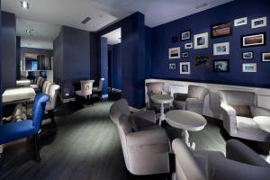 
El salón o zona de bar de c-hotels Club
