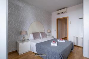 Posteľ alebo postele v izbe v ubytovaní Alcam Vila Olímpica