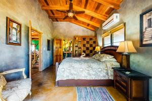 Ένα ή περισσότερα κρεβάτια σε δωμάτιο στο La Casa Pura Vida