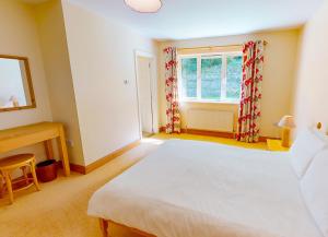 Letto o letti in una camera di Fishermans Grove 3 Bed by Trident Holiday Homes