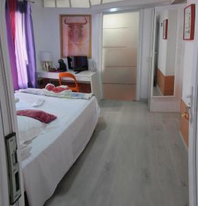 Łóżko lub łóżka w pokoju w obiekcie B&B Casa Alfareria 59