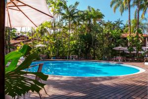 a pool at the resort at Hotel Aldeia de Sahy in Barra do Sahy