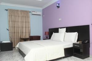 Letto o letti in una camera di Ilaji Hotels and Sports Resort