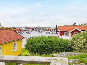 a view of a harbor with boats in the water at 4 person holiday home in R nn ng in Rönnäng
