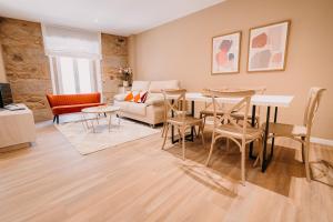 Posedenie v ubytovaní Apartamentos Rúa Vella