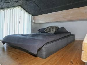 Postel nebo postele na pokoji v ubytování 10 person holiday home in Brovst-By Traum