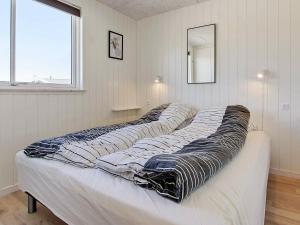 Postel nebo postele na pokoji v ubytování Luxury Retreat in Blavand - By Traum Ferienwohnungen