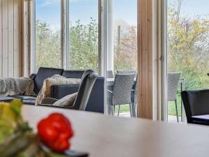 Posezení v ubytování 10 person holiday home in Hasselberg
