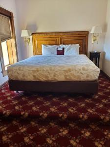 En eller flere senge i et værelse på Manresa Castle