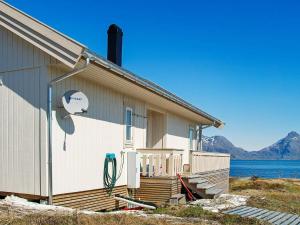 a building with a face painted on the side of it at 6 person holiday home in Dønna in DÃ¸nnes