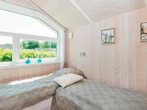 Postel nebo postele na pokoji v ubytování Modern Spa Retreat in Als - By Traum Ferienwohnungen