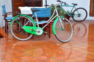 two bikes are parked next to a chair at B&B CasaCorì in Orosei