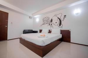 Fun-D City View SHA Plus客房内的一张或多张床位
