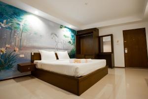 Fun-D City View SHA Plus客房内的一张或多张床位