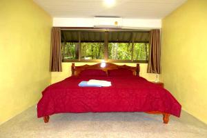 Llit o llits en una habitació de Isaan Perazim Park