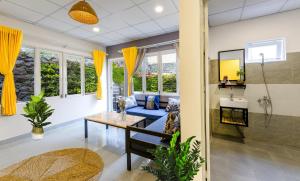 Χώρος καθιστικού στο Homestay Vườn Pháp