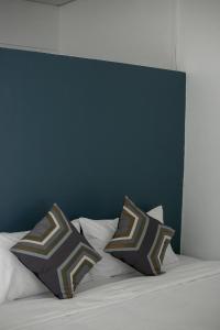 Ein Bett oder Betten in einem Zimmer der Unterkunft Baannokhook Home&Cafe