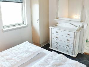 Postel nebo postele na pokoji v ubytování Holiday Home Helmklit II