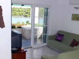 Część wypoczynkowa w obiekcie Holiday Home in Veli Rat near Saharun