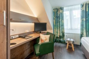 Kuchyň nebo kuchyňský kout v ubytování Hotel Arosa Düsseldorf Oberkassel
