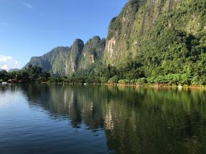 a view of a river with mountains in the background at Exotic Fishing Thailand in Phangnga