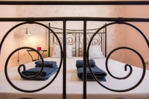 En eller flere senge i et værelse på Apartamento Abuelo Miguel