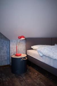 Posteľ alebo postele v izbe v ubytovaní JDK Apartamenty Legionów 40m2 5-osobowy
