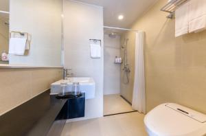 Koupelna v ubytování Shin Shin Hotel Cheonjiyeon