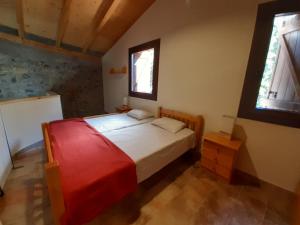 Posteľ alebo postele v izbe v ubytovaní Casa del Pont