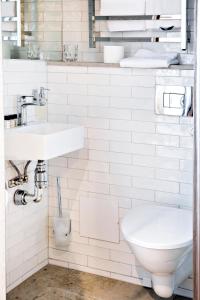 Koupelna v ubytování Hotell Visby Börs + 22 fotografií