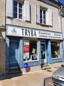 a tyrka territories store with a sign in front of it at Au Zen Garden in Auxerre