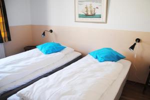 Postel nebo postele na pokoji v ubytování Hotell Vesterhavet