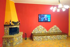 A television and/or entertainment centre at Profumo di Zagara