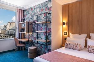 Postel nebo postele na pokoji v ubytování Leonardo Boutique Hotel Paris Opera