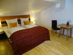 Postel nebo postele na pokoji v ubytování Appartementhaus Mayrhofen by PiaundDirk