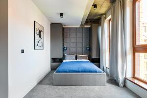 Posteľ alebo postele v izbe v ubytovaní Homewell Boutique Apartments Stare Miasto