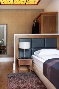 Llit o llits en una habitació de Hotel Zamek Lubliniec