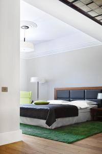 Llit o llits en una habitació de Hotel Zamek Lubliniec