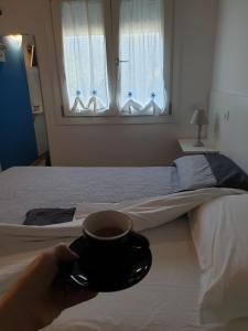 Łóżko lub łóżka w pokoju w obiekcie Il Rifugio Del Tempo