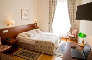 Posteľ alebo postele v izbe v ubytovaní Hotel Polonia