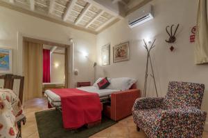 Posteľ alebo postele v izbe v ubytovaní Fontanella Borghese Apartment - FromHometoRome