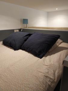 מיטה או מיטות בחדר ב-B&B Bordeaux Saint Michel