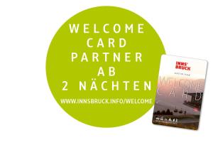 two books are sitting next to each other at Sporthotel Igls in Innsbruck