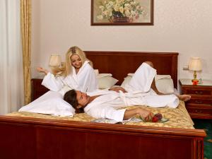Letto o letti in una camera di Hotel Stefanik