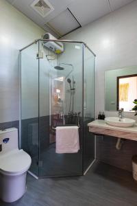 Koupelna v ubytování MH Cherish Homestay