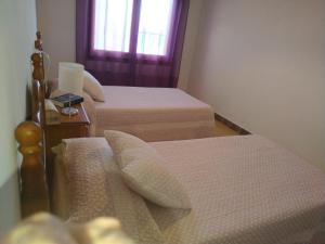 Posteľ alebo postele v izbe v ubytovaní Miami APARTAMENTO ANITA