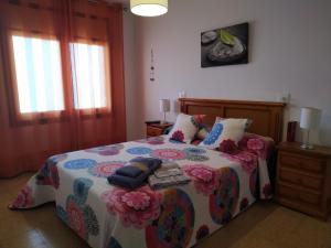 Posteľ alebo postele v izbe v ubytovaní Miami APARTAMENTO ANITA