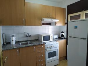 Kuchyňa alebo kuchynka v ubytovaní Miami APARTAMENTO ANITA