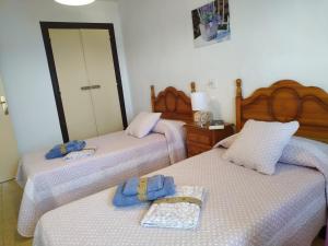 Posteľ alebo postele v izbe v ubytovaní Miami APARTAMENTO ANITA