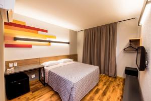 Postel nebo postele na pokoji v ubytování Hotel 10 Balsas